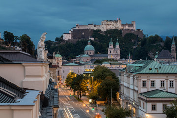Fototapeta na wymiar high angle viiew of Salzburg city with cathedral and caste at sunset
