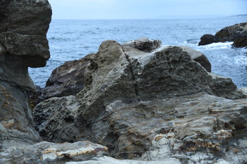 Fototapeta na wymiar 水平線と岩石