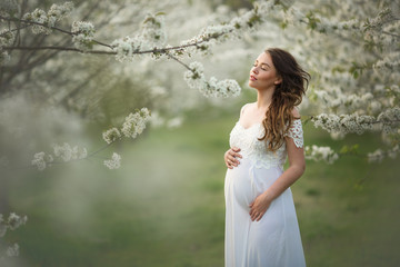 Beautiful pregnant woman outdoor