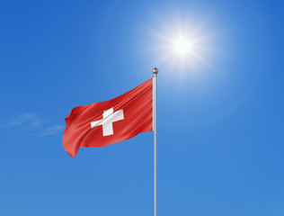 3D illustration. Colored waving flag of Switzerland on sunny blue sky background.