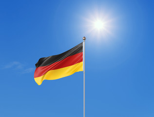 3D illustration. Colored waving flag of Germany on sunny blue sky background.