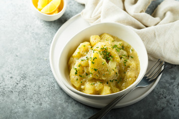 Homemade potato salad with fresh parsley