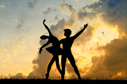 ballet dancers couple at sunset