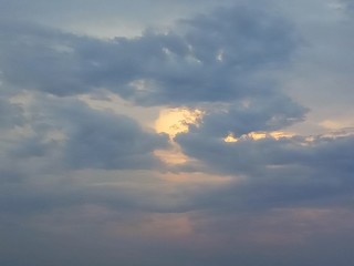 sky with clouds and sun