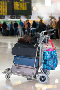 luggage on a cart in an airport