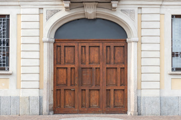 wooden arched house door Monza, Europe