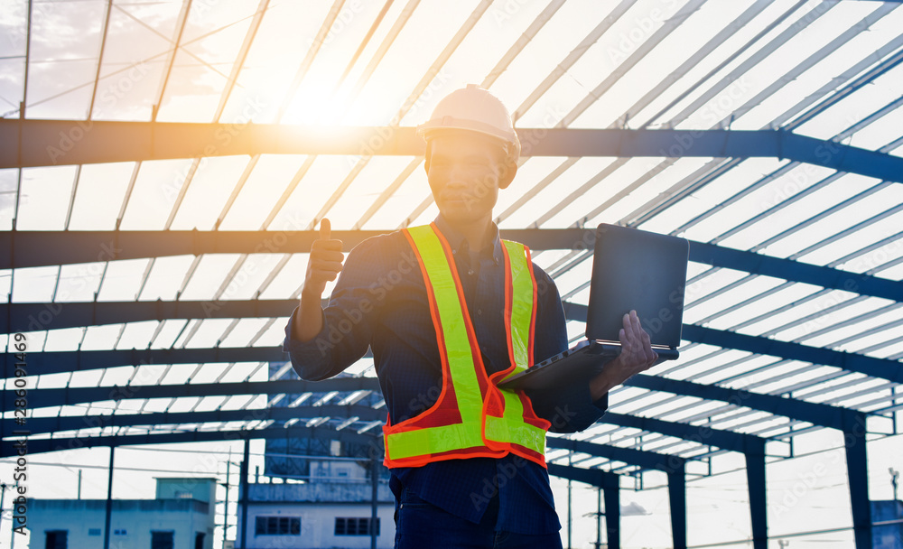 Aufkleber engineer holding computer working on side technology building construction