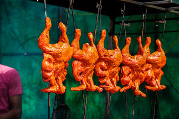 Hanging non veg food chicken on the shop meet shop good source protein, fat, healthy , gym diet - Image