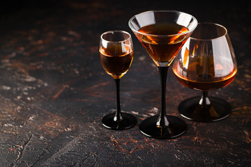 Set of strong alcoholic drinks in glasses
