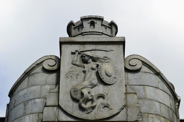 Warsaw's mermaid - symbol of Warsaw closeup, bas-relief on the Poniatowski Bridge in Warsaw, Poland © PaulSat