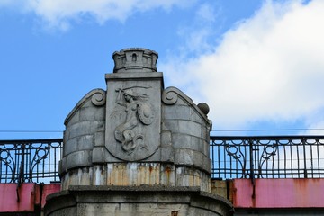 Warsaw's mermaid - symbol of Warsaw, bas-relief on the Poniatowski Bridge in Warsaw, Poland © PaulSat