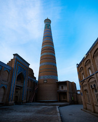 minaret and madrasa in khiva