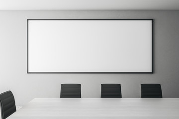 Modern meeting room with poster
