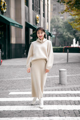 Asian girl walking on the street