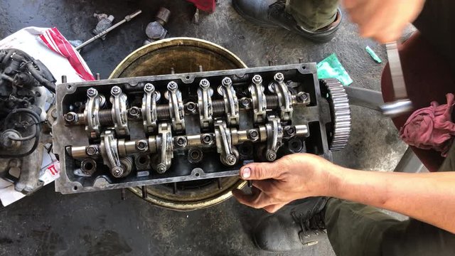 Hands on Car Engine Block petrol gasoline cylinder cam shaft spring rocker arm valve Repair refurbish