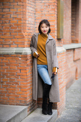 Asian fashion girl walking on the street