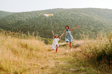 Mom and daughter have fun in nature