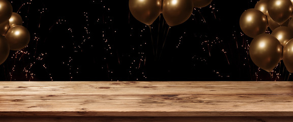 Table with fireworks and golden ballons