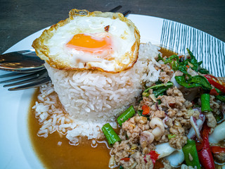 Stir-fried minced pork with Basil, Fried egg over rice , Famous Thailand street food