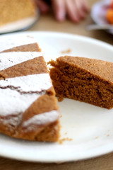 Homemade sponge cake served on a table. Selective focus.