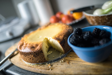 cheese cake with fruits and berries sliced