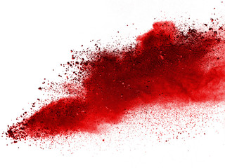 Red powder explosion on white background. Colored cloud. Colorful dust explode. Paint Holi.
