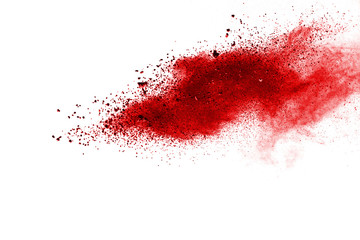 Red powder explosion on white background. Colored cloud. Colorful dust explode. Paint Holi.