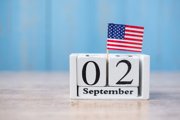 2 September of white Calendar with United States of America flag on wood background. copy space for text. Happy Labor day 2019 and Holiday concept