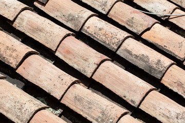 Antique clay roof tiles of the historical houses in the small town of Mongui in Colombia