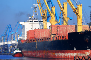 Cargo ship (Bulk carrier) loading in cargo terminal of Riga
