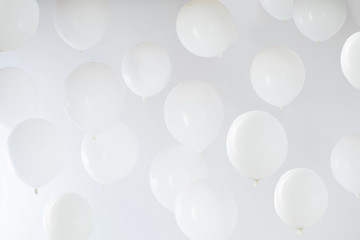 white balloons on white background