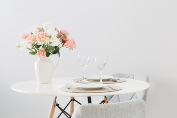 served table with  bouquet of roses