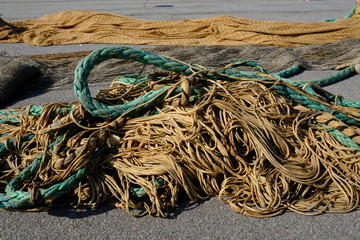 Tangle of Ropes on a pier in a fishing port
