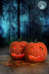 Halloween glowing pumpkins with fog