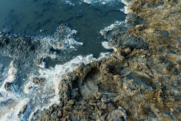 close up of high resolution texture of crystallized salt in a lake. space landscapes. Beatiful colors of nature. Travel photo background. Dried sea salt in the ground