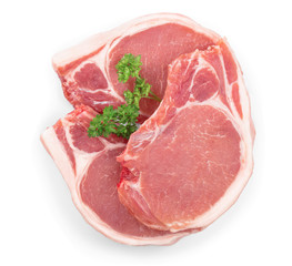 sliced raw pork meat with parsley isolated on white background. Top view. Flat lay
