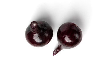 Red onion isolated on white background.