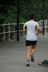 Young man running in the park