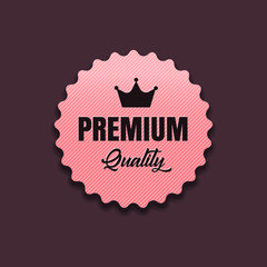 Pink badge premium quality on the brown background