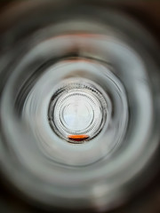 the last drops of wine at the bottom of the bottle