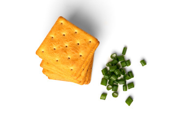 Cracker cookies with onion isolated on white background.