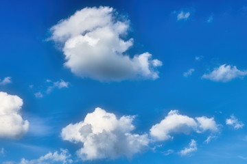 Obraz na płótnie Canvas Blue sky background with white clouds