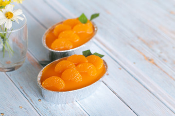 Homemade orange cake on wooden vintage table background