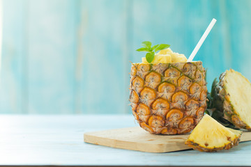 Fototapeta na wymiar Pineapple Juice Pieces Pineapple Healthy Drink and summer fruit drink Concept
