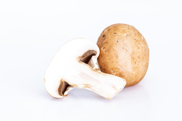 Fresh champignon mushrooms on white background, Isolated food and nature object
