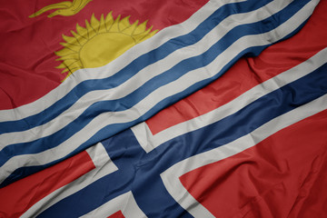 Fototapeta na wymiar waving colorful flag of norway and national flag of Kiribati ,.