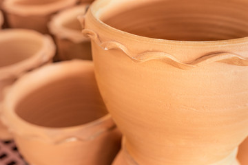 Empty ceramic brown flower pots for sale in Garden shop, Lots of orange brown terracota flower pots.