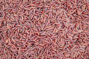 Long grain red rice background, Close up shot of the red rice background,  closeup