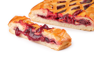 two pieces of open cherry pie, isolated on white background