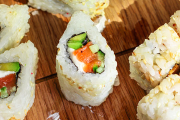 sushi rolls seafood, nori and other ingredients (delicious Japanese food) menu. top food background. copy space
